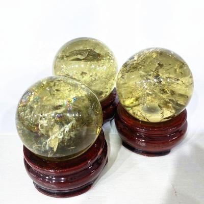 China Europe Hot Selling Crystals Healing Stones People Open Yellow Rainbow Quartz Crystal Ball Citrine Sphere for sale