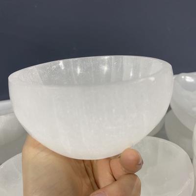 China Hot Sale Europe Gemstone Hand Carved Healing Folk Crafts Quartz Round Shape Natural Selenite Crystal Bowl for sale