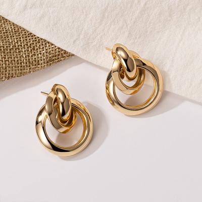 China 2022 New Fashion Metal Drop Earrings Stainless Steel Environmental Friendly Twist Gold Single Earrings for sale