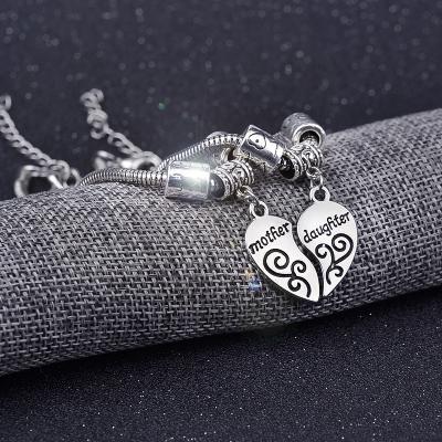 China Silver Plated Love Heart Bracelet Eco-Friendly Peach Series Family Daughter Mother Daughter 2pcs Heart Bracelet For Women for sale