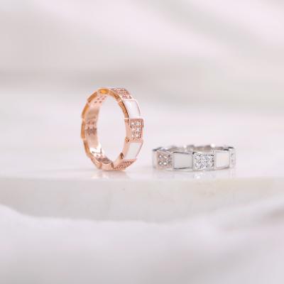 China High Quality Diamond Oil Dripping Snake Bone Trendy Couples Ring Rose Gold Zircon Finger Rings For Women for sale