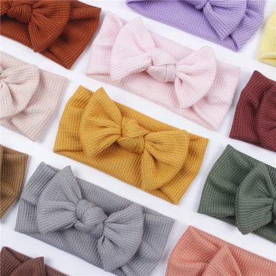 China Handmade Waffle Knitted Bow Hair Material Kids Friendly Bands Organic Bow Baby Hair Band And Turban for sale