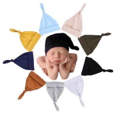 China Newborn Unisex Sleep Sweater Solid Color Cotton Knot Baby Head Turban Hats Four Seasons China Friendly Material for sale