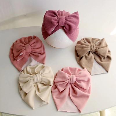 China Wholesale Solid Baby Hat Big Bowknot Knot Head Winter Friendly Material Wraps Turban Hats Baby for sale