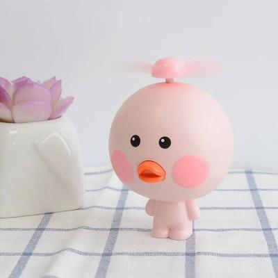 China 2019 Summer Travel Cartoon Duck Handheld USB Charging Small Electric Fan for sale