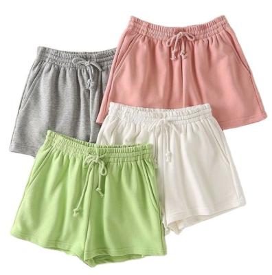 China QUICK DRY cotton sports loose casual shorts with high waists and elastic-cord for sale