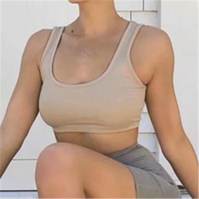 China Pure color anti-shrink ties yoga vest leak yoga umbilical tank tops brief paragraph workout sexy tank top for sale