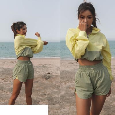 China 2022 Y-0004 Amazon Summer New Women Breathable Chives Sportswear Pullover Women's Top Casual Shorts Set Running Clothes for sale