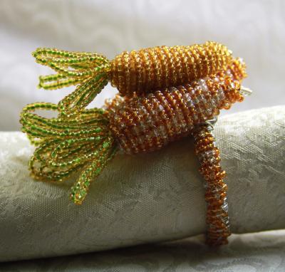 China Viable Bulk Wholesale Design Glass Beads Carrot Napkin Ring for sale