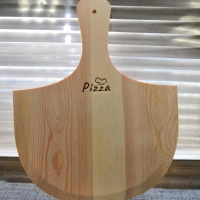 China Sustainable Natural Pine Wood Pizza Skin With Handle For Homemade Pizza And Bread Baking for sale