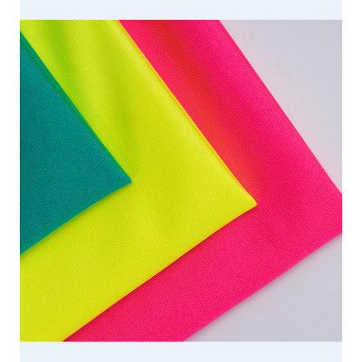 China High quality popular cheap lycra spandex stretch polyester 15 shiny stretch fabric 85 for clothes for sale