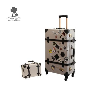 China Factory Hot Sale New Arrival Good Quality Vintage Luggage Trolley Bag PU Leather Travel Trolley Filter Bezel Luggage With Sticker for sale