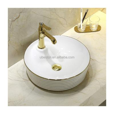 China UBEST New Design Easy Clean Porcelain Gold Color Rectangular Ceramic Black Wash Basin Above Counter Counter Top Sinks for sale