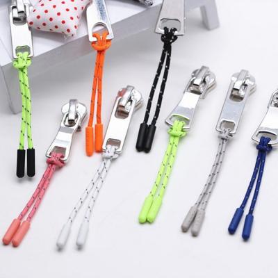 China Wholesale Custom Color Nickel Free Zipper Pulls Rope Cord Ends Buckle Zipper Puller For Backpack Clothes for sale