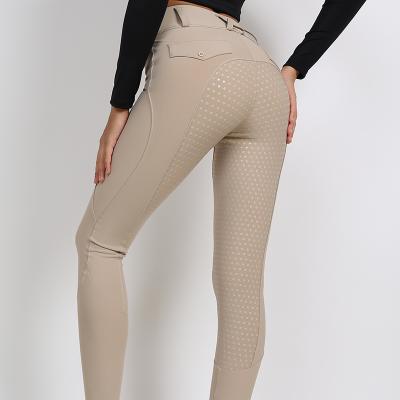 China Durable Beige Outdoor Woman Equestrian Jodhpurs Breeches Riding Pants Tights With Pocket Equitacion Four Way English Riding Pants for sale