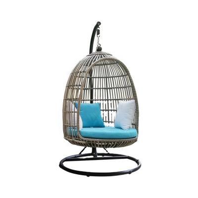 China Modern Rattan Egg Swing Chair Hanging Chair With Metal Stand Patio Swings for sale