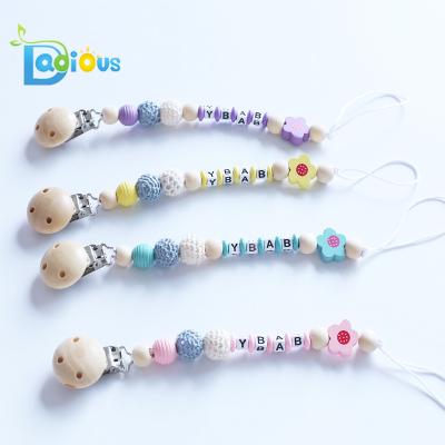 China Hot Selling Baby Feeding Products Wooden Pacifier Holder Chain Adult Baby Silicone Pacifier Clip for sale