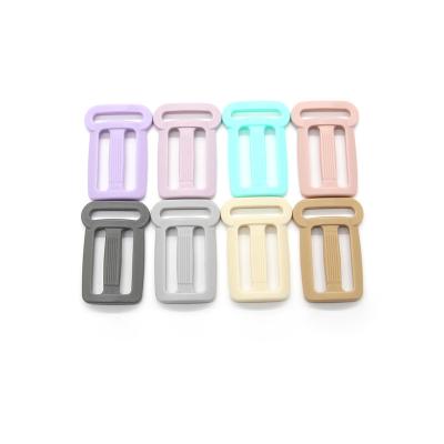 China 0EM Custom OEM Accept 40mm Full Color Adjustable Plastic 2.6g Slip Tri Slips Camera Bag Strap Buckles for sale