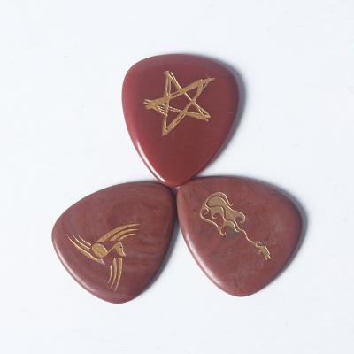 China RTS Fashionable Wholesale Handmade Semi-precious Red Jasper Guitar Pick for sale