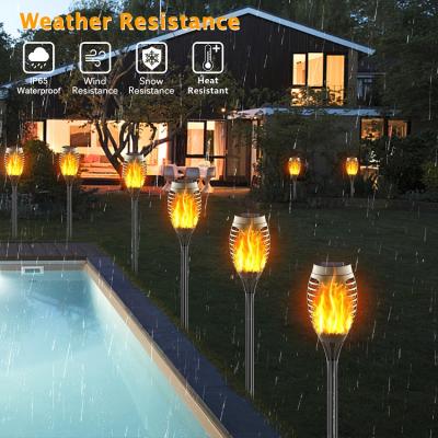 China Outdoor Solar Garden Lantern Flame Lamp Patio Decor Hanging Lantern Christmas Halloween Christmas Flame Torch Flickering Light for sale