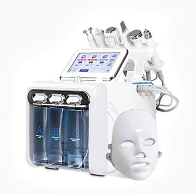 China Home Use Beauty Equipment Anti-Puffiness Ultrasonic 12 In 1 Facial Machine for sale