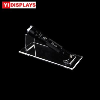 China Durable Acrylic Clear Knife Display Torch Holder Desktop Wine Bottle Holder Gun Display Rack for sale