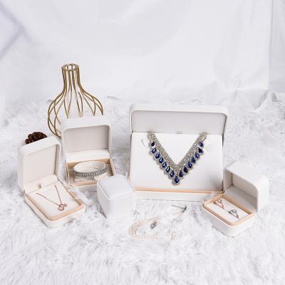 China Custom Jewelry Box Ring Jewelry Packaging SUNDO Luxury Wholesale Rose Black White Leather Bracelet Necklace Jewelry Box for sale