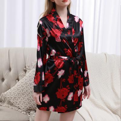 China Spring and summer QUICK DRY silk pajamas for ladies with floral print lapel tie long sleeve dress for ladies home wear for sale