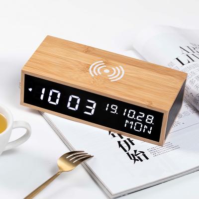 China Sizes Wooden Speaker Digital Led Clock With Wireless Charging Sound Control for sale