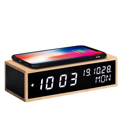 China High Quality Concise Calendars Design Bamboo Led Digital Wireless Charging Clock With Promotional Good Sound Speaker for sale