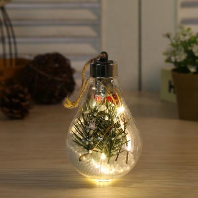 China 2022 Fashionable Christmas Ornaments 7*11CM Hanging Bauble Bulb Sublimation Christmas Lights Transparent Decoration for sale