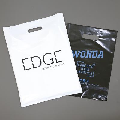 China Recyclable Custom Design Eco-friendly PE Plastic Clothing Shopping Bag With Die Cut Handle for sale