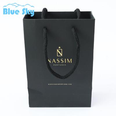 China Wholesales Recyclable Custom Luxury Apparel Retail Bag Packing Gift Bag Black Shopping Packaging Paper Bags With Handles for sale