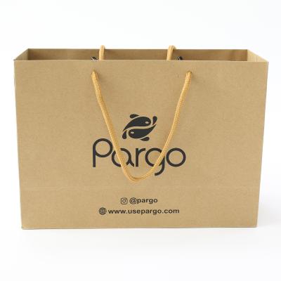 China Biodegradable Environmental Friendly Heavy Duty Kraft Paper Bags With Ribbon Handles for sale