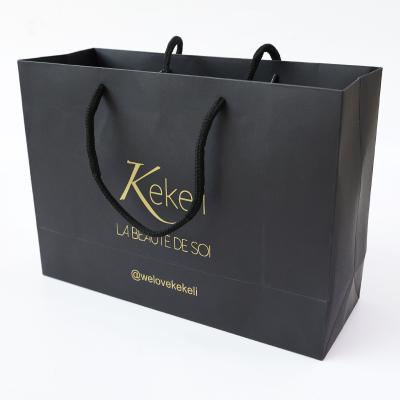 China Recyclable High Quality Kraft Paper Bags Jewelry Gift Shopping Packaging Bags In Black Color for sale