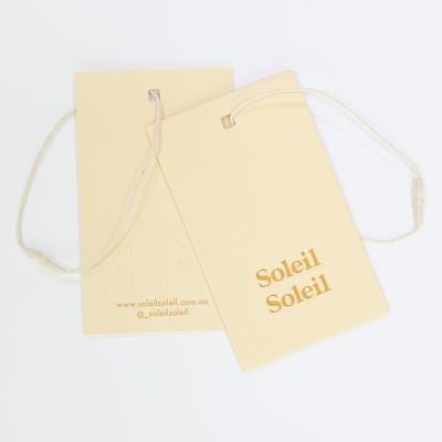 China Viable wholesale private label logo embossing clothes hang tags with bale string for jacket/bags garment for sale