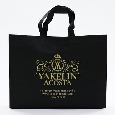 China Custom Recyclable And Reusable Garment Accessories Washable Black Nonwoven Shopping Bag With Gold Printed LOGO for sale