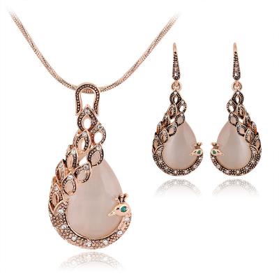 China Wholesale Fashion Alloy Rhinestone Romantic Peacock Gemstone Necklace Earring Set for sale