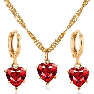 China Ethnic hot sale jewelry set wire chain red crystal necklace copper twisted classic zircon love necklace copper earrings for sale