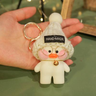 China Lovely Cartoon Doll Car Bag Key Duck Key Chain Pendant Hyaluronic Acid Children Game for sale