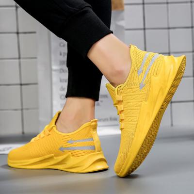 China OEM Couples Shoes Men Sneakers Shoes Yellow Football CUSHIONING Mens Casual Shoes For Men for sale