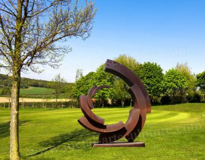 China Rusty Round Circle Shape Corten Steel Statue As Outdoor Lawn Ornament for sale