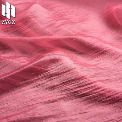 China Sheer Polyester Yarn Tulle Dress Fabric Wrinkle Feeling YUN Skin Soft High End Clothing Dress Fabric for sale