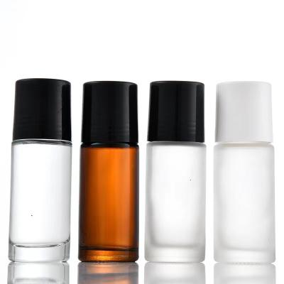 China Personal Care Cosmetics 30ml 50ml Empty Essential Oil Bottles Rollball Spray Essential Oil Amber Clear Glass Bottle for sale