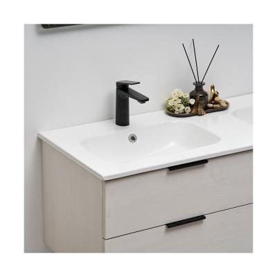 China Modern Guaranteed Hand Ceramic Wash Basin New Quality Small Sink Unique Design for sale