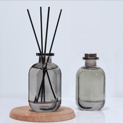 China Gift & 120ml 250ml 60ml Empty Amber Round Tubular Glass Craft Diffuser Aroma Bottle for sale