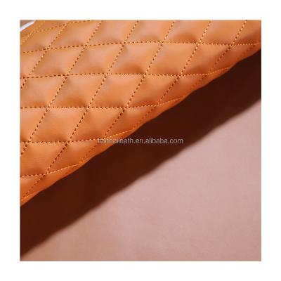 China Anti-Mildew Quilted Leather PVC Leather Metallic Colors With Checker And Upholtery Quilting Supplier for sale