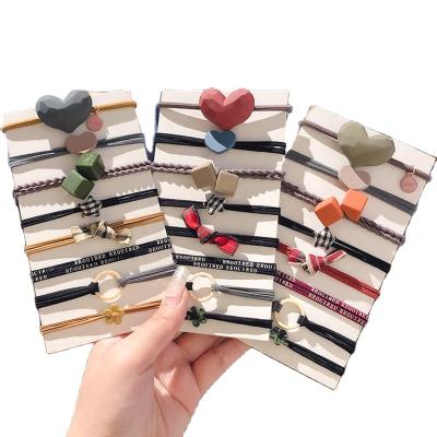 China Cute Durable Korean Elastic Headbands Teen Girls Coil Ponytail Holders Hair Ties Hair Clip for sale