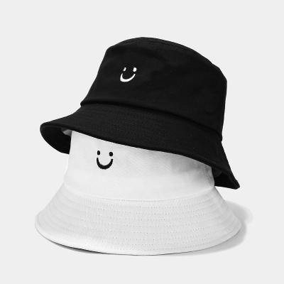 China Reversible Double-side-wear Travel Beach Sun Visor Bucket Hat Smile Face Soft Comfortable Unisex Embroidery Hat for sale