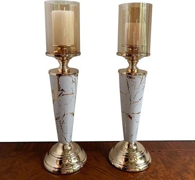 China High quality high end unique home decoration metal pillar and glass material fashion decor candle holders for sale